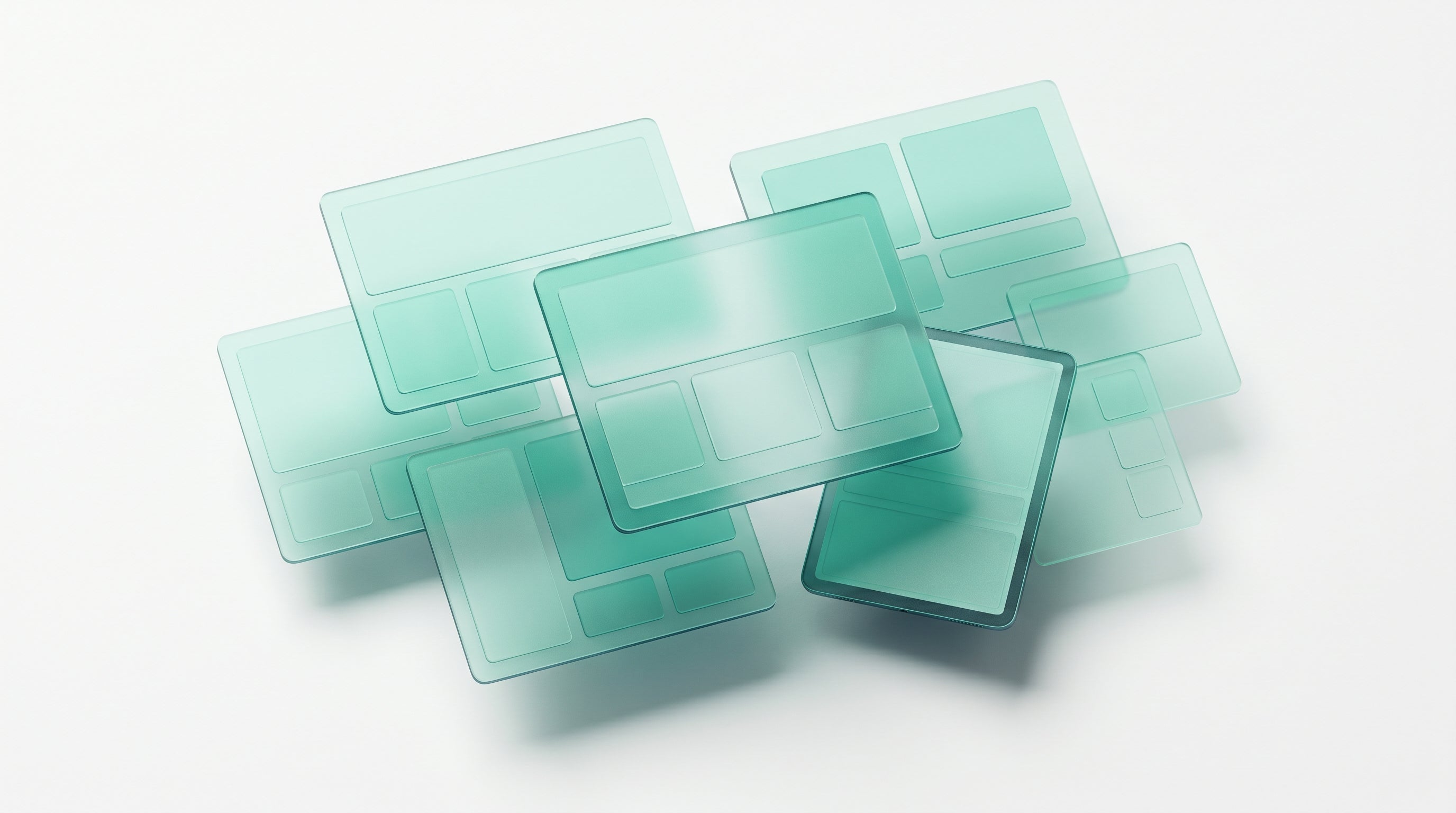 Overlapping mint-glass website screens — a showcase of the studio's range across e-commerce, SaaS, editorial and brand work.